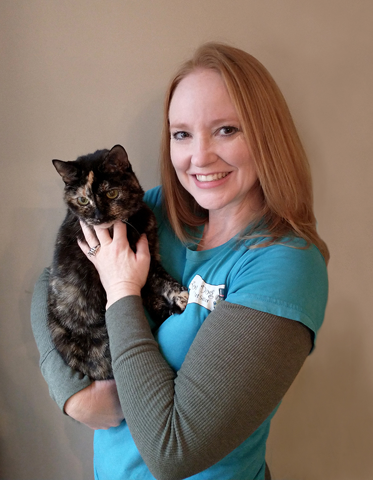 Christina holds our Tortoise cat, Button.